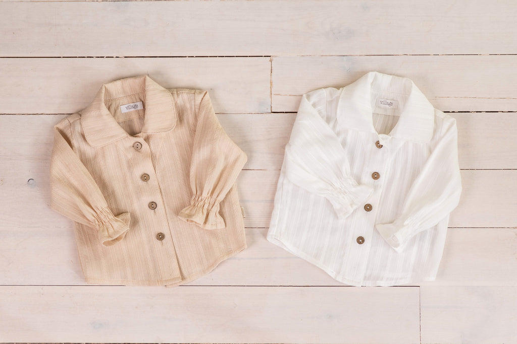 Open planner with calendar and daily plan on a wooden surface