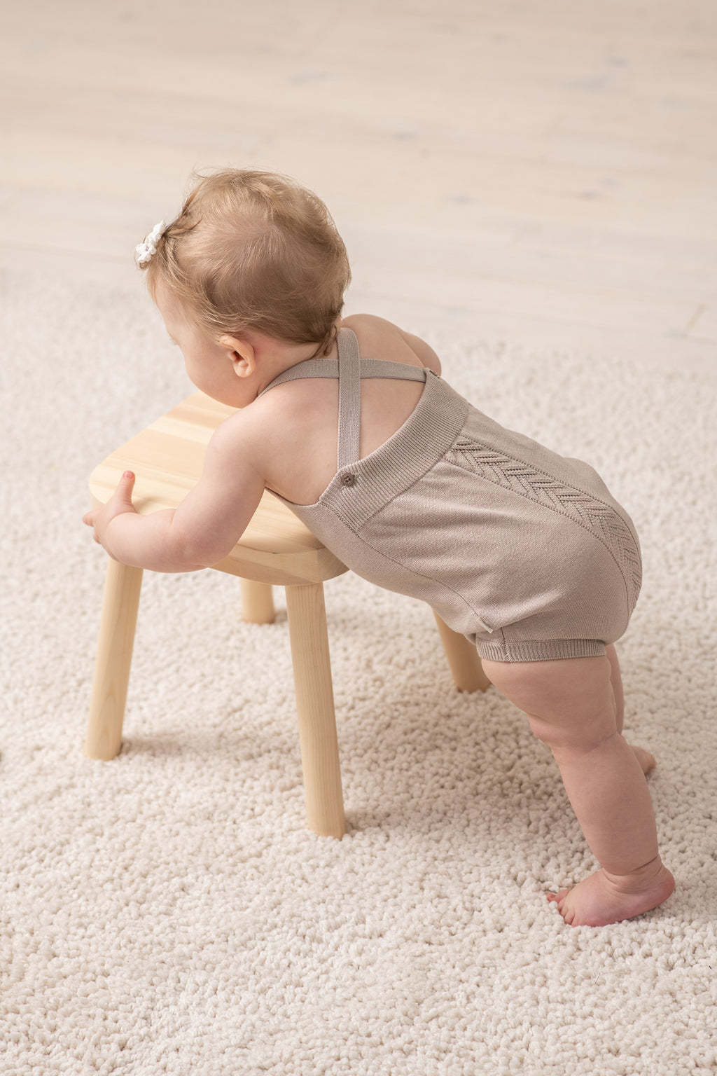 Person holding two '2026 Christian Planner' books with a fireplace in the background