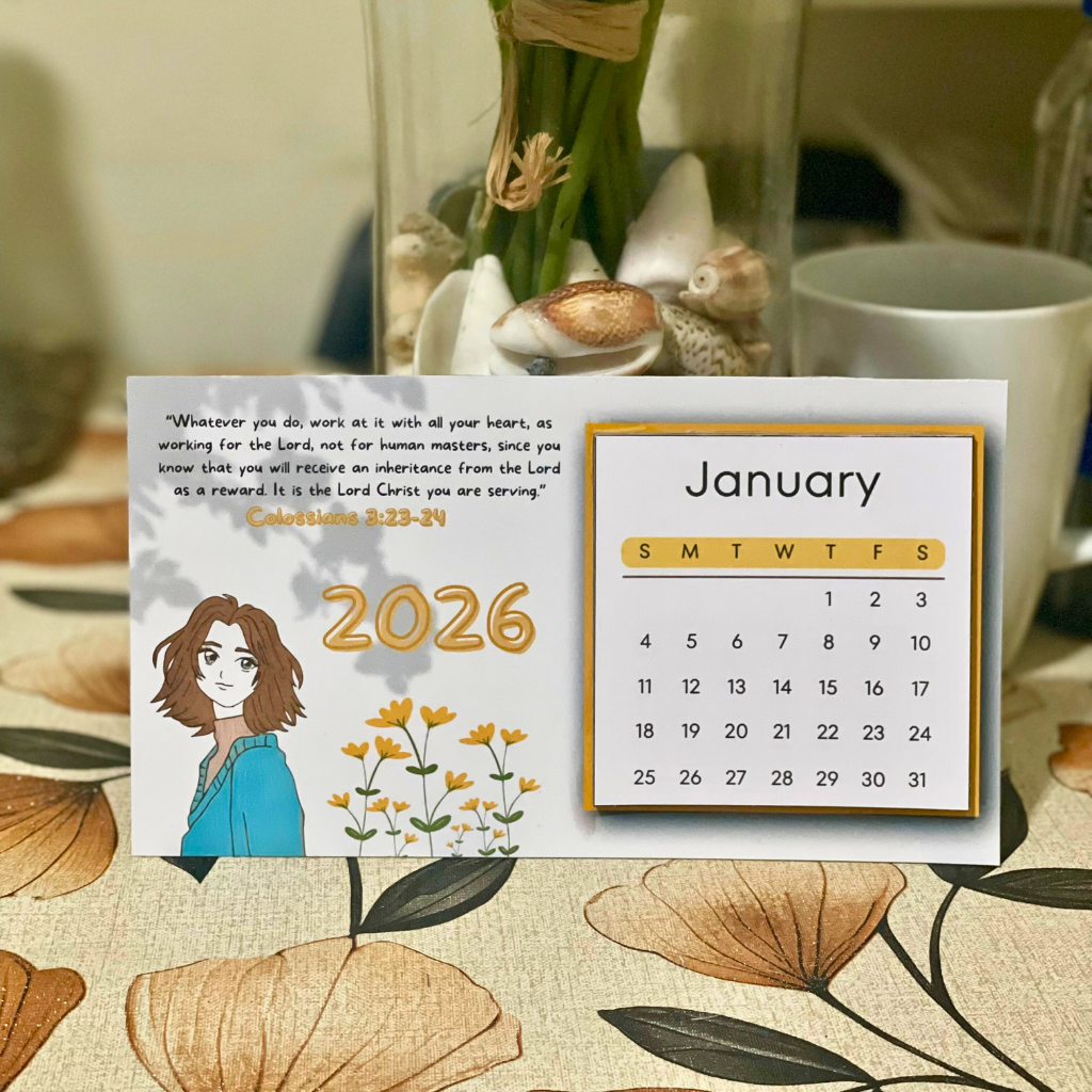 Calendar for January 2026 with a motivational quote on a decorative table setting.